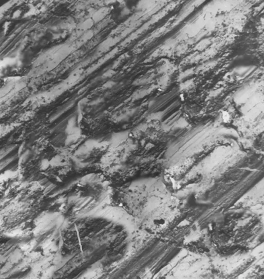 Фотографии поверхностей металлического вкладыша после трения с увеличением х2000: смазочная композиция №4